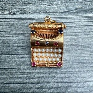 Vintage 14 karat gold typewriter charm